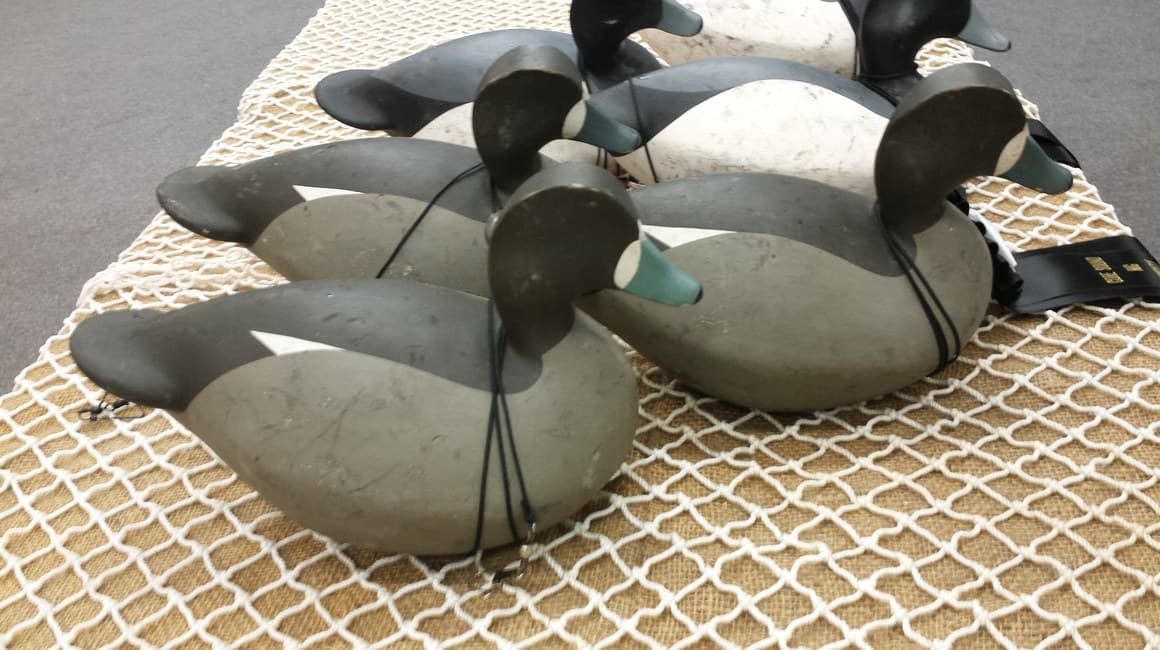 A rig of hand-carved working decoys with anchor lines coiled, made on Chincoteague Island.