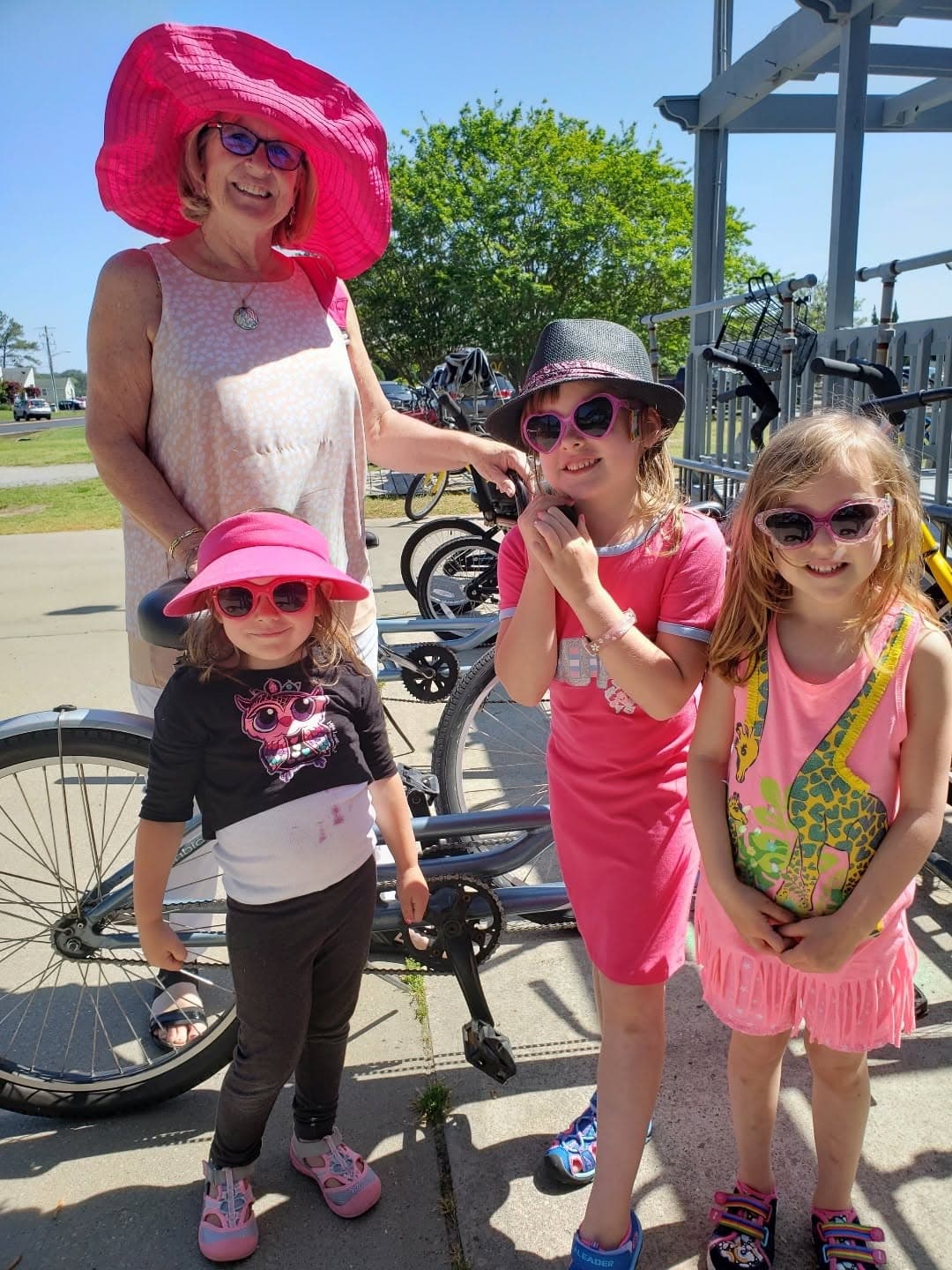 Jane Wolffe — Gigi to her grandchildren — with some of her grandchildren and nieces at the Bike Depot next door.